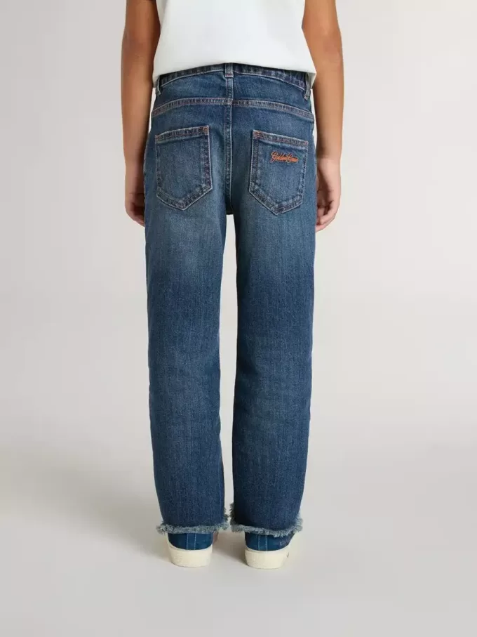 Vaqueros de denim para niño con borde sin rematar y bordados