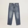 Vaqueros elásticos para niño en denim azul.