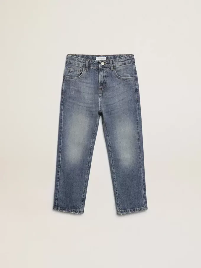 Vaqueros elásticos para niño en denim azul.