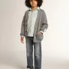 Vaqueros elásticos para niño en denim azul.