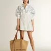 Vestido camisero corto de mujer en algodón a rayas blancas con estampado azul marino Vestido camisero corto de mujer en algodón a rayas blancas con estampado azul marino