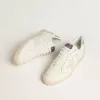 Zapatillas Ball Star LTD para mujer con estrella de patchwork y lengüeta metálica en el talón. Zapatillas Ball Star LTD para mujer con estrella de patchwork y lengüeta metálica en el talón.