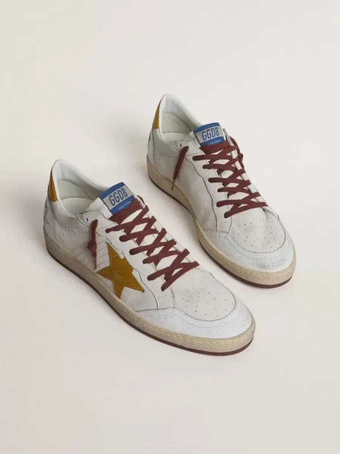 Zapatillas Ball Star para hombre en piel napa blanca con estrella y lengüeta en el talón en piel con estampado animal amarillo Zapatillas Ball Star para hombre en piel napa blanca con estrella y lengüeta en el talón en piel con estampado animal amarillo
