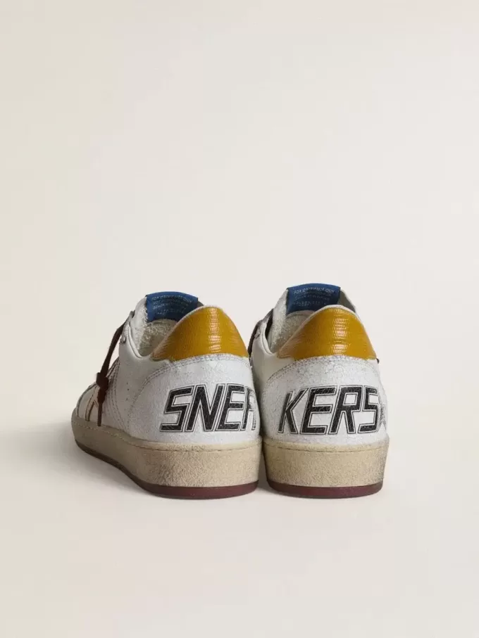 Zapatillas Ball Star para hombre en piel napa blanca con estrella y lengüeta en el talón en piel con estampado animal amarillo Zapatillas Ball Star para hombre en piel napa blanca con estrella y lengüeta en el talón en piel con estampado animal amarillo