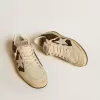 Zapatillas Ball Star para mujer con purpurina, estrella de piel y lengüeta metálica en el talón. Zapatillas Ball Star para mujer con purpurina, estrella de piel y lengüeta metálica en el talón.