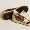 Zapatillas Ball Star para mujer con purpurina, estrella de piel y lengüeta metálica en el talón. Zapatillas Ball Star para mujer con purpurina, estrella de piel y lengüeta metálica en el talón.