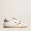 Zapatillas Old School para mujer con estrella dorada en piel laminada Zapatillas Old School para mujer con estrella dorada en piel laminada