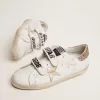 Zapatillas Old School para mujer con estrella dorada en piel laminada Zapatillas Old School para mujer con estrella dorada en piel laminada