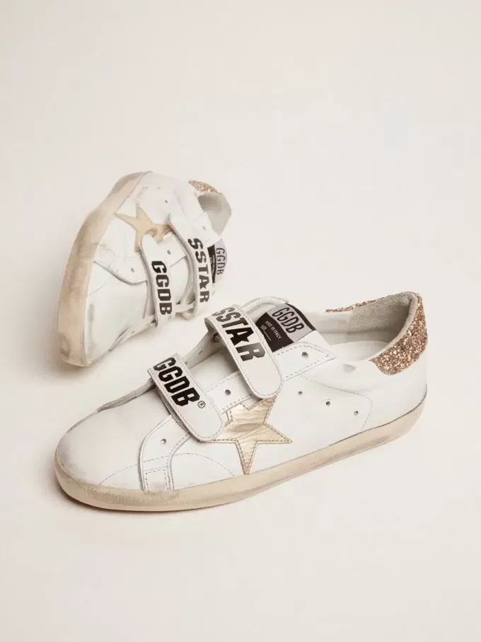 Zapatillas Old School para mujer con estrella dorada en piel laminada Zapatillas Old School para mujer con estrella dorada en piel laminada
