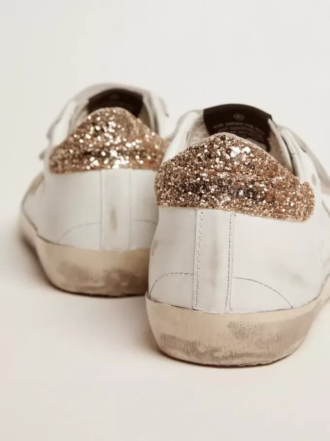 Zapatillas Old School para mujer con estrella dorada en piel laminada Zapatillas Old School para mujer con estrella dorada en piel laminada