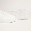 Zapatillas Purestar blancas con lengüeta naranja fluorescente en el talón