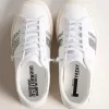 Zapatillas sostenibles Yatay Modelo 1B con parte superior blanca de origen biológico y purpurina plateada reciclada Y Zapatillas sostenibles Yatay Modelo 1B con parte superior blanca de origen biológico y purpurina plateada reciclada Y