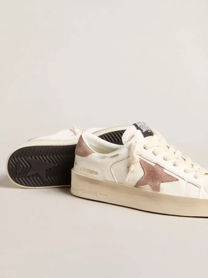 Zapatillas Stardan con estrella y lengüeta del talón de piel rosa texturizada Zapatillas Stardan con estrella y lengüeta del talón de piel rosa texturizada
