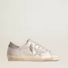 Zapatillas Super-Star en piel gris-blanca con efecto brillante y estrella de piel Zapatillas Super-Star en piel gris-blanca con efecto brillante y estrella de piel