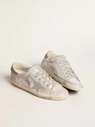 Zapatillas Super-Star en piel gris-blanca con efecto brillante y estrella de piel