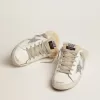 Zapatillas Super-Star Sabot para mujer en piel blanca y forro de borreguillo Zapatillas Super-Star Sabot para mujer en piel blanca y forro de borreguillo